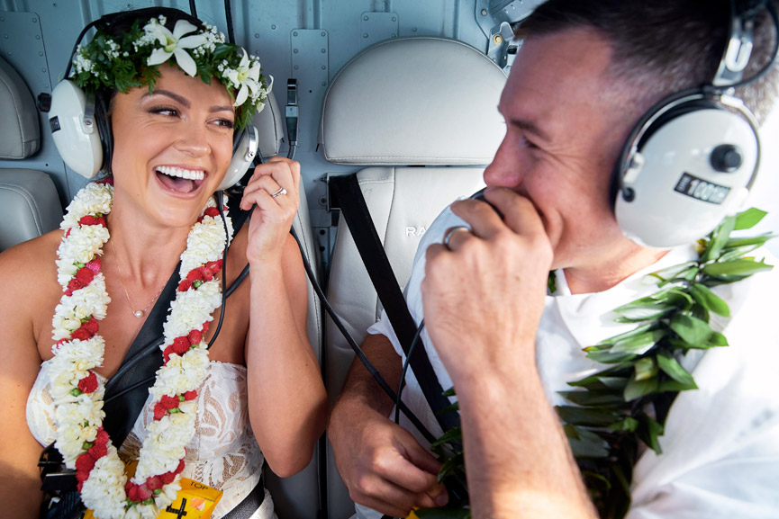 Couple with leis inside Rainbow Helicopter
